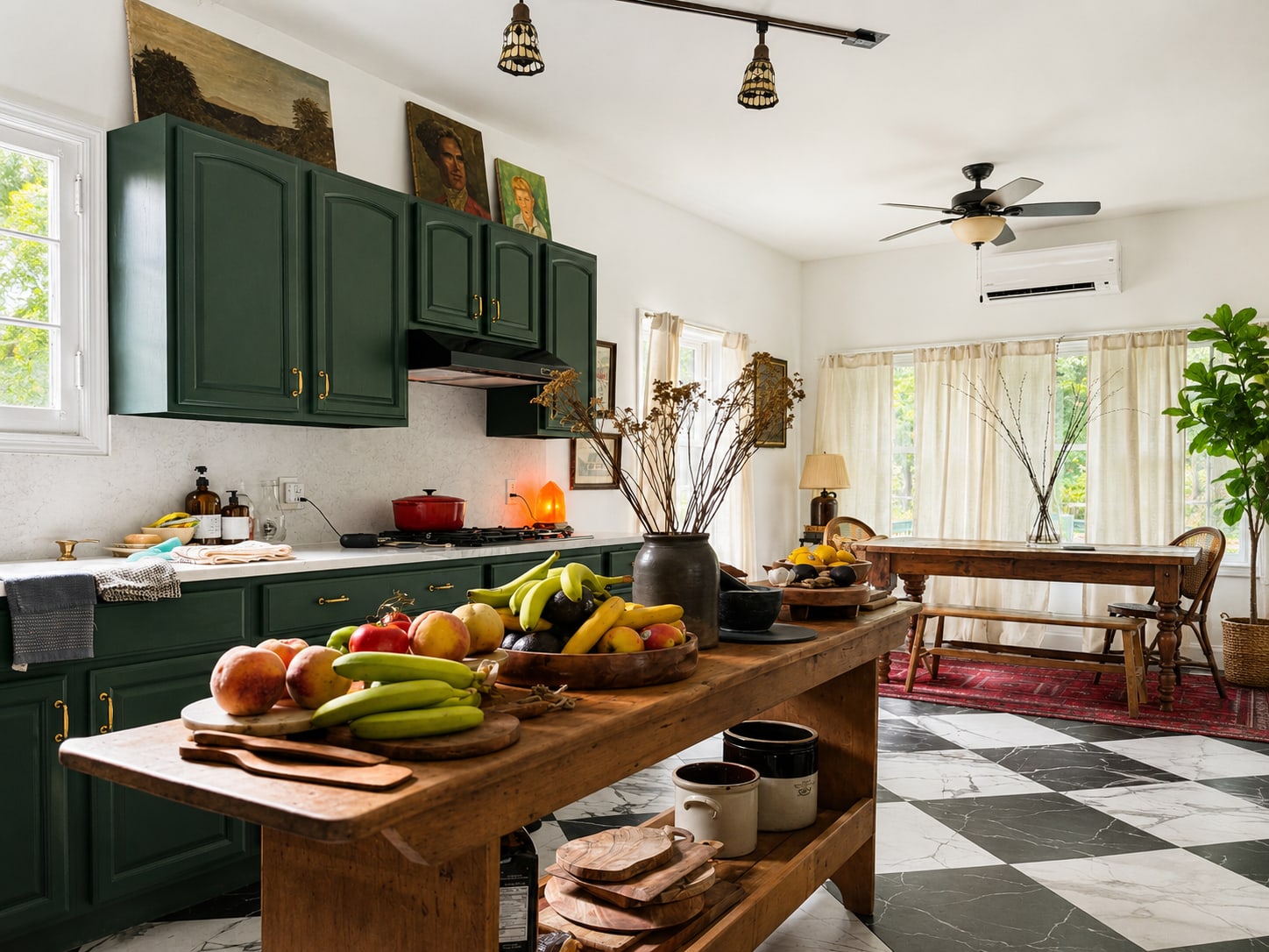 Kitchen cabinets refinished in a deep green with brass hardware, over a checkerboard tile floor